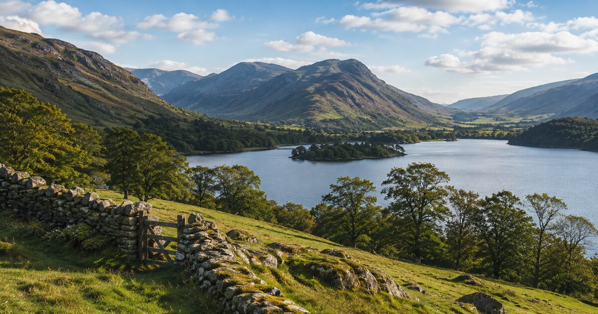 Lake District landscape with dry stone wall, gate and lake surrounded by mountains